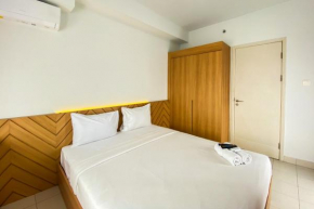 Comfort 1BR at Patraland Urbano Apartment By Travelio